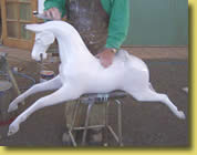 Fill, sand and undercoat the rocking horse